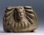 Antike Kunst - Dachziegel mit der Darstellung des Dionysos-Kopfes