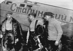 Anonymous - Alexander Belyakov, Georgiy Baidukov and Valery Chkalov by their plane on June 20, 1937