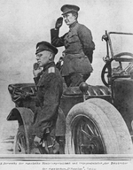 Anonymous - Kerensky saluting marching troops from his staff car