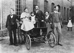 Anonymous - Carl Benz with his family at his Benz Velo in the Mannheim factory yard