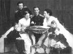 Anonymous - Grand Duke Nicholas Konstantinovich (left) with sister Olga, her groom Georg of Greece, mother