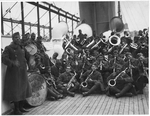 Anonymous - Lieutenant James Reese in Europe (far left) with the jazz band of the 369th Infantry Regiment, on the boat that brings them back