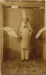 Anonymous - Hugo Ball in a cubist costume in the Cabaret Voltaire, June 1916