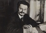 Anonymous - Le?on Trotsky at his writing desk 