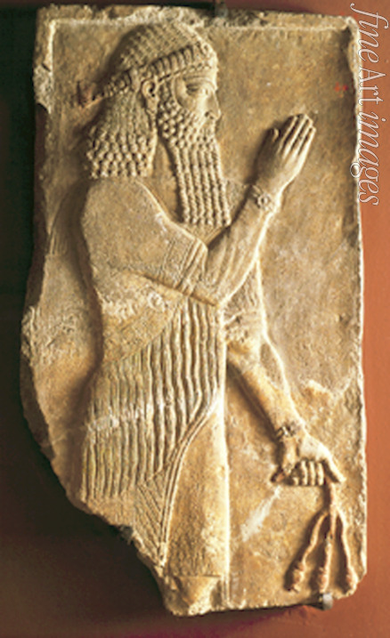 Assyrian Art - Priest with a branch of pomergranate tree. Detail of a relief from the palace of Assyrian king Sargon II