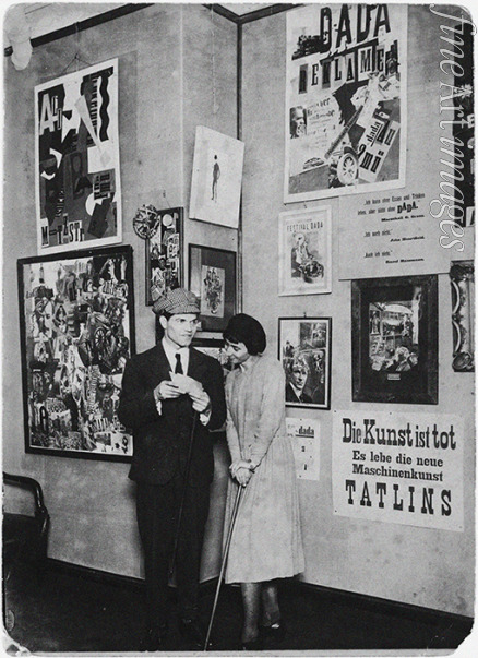 Anonymous - Hannah Höch and Raoul Hausmann in front of their works at the 